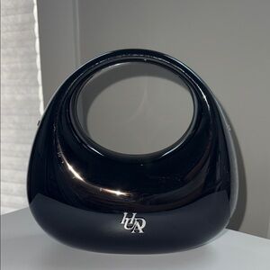 HUDA BEAUTY Black Sculptural Oval Handle Bag